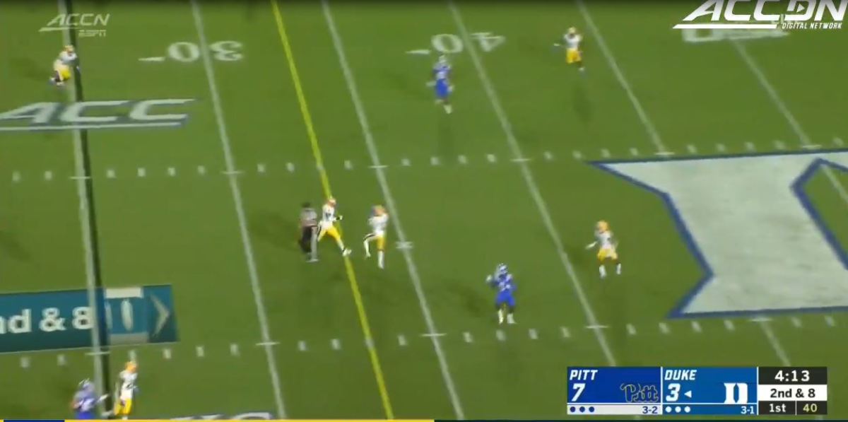Ford (between yellow line and 35) makes the interception, several yards behind Calhoun (on hash mark at 37)