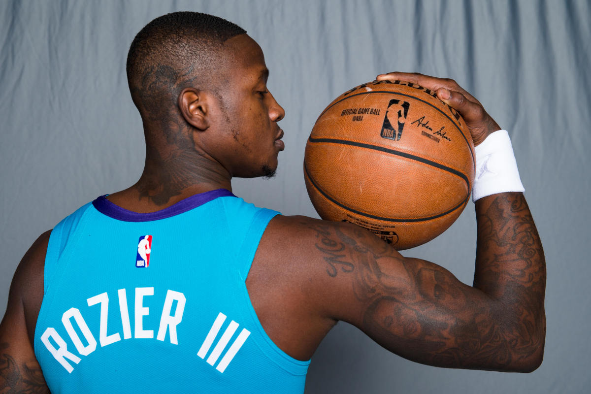 Charlotte Hornets guard Terry Rozier (3) poses for pictures during media day at Spectrum Center. (Jeremy Brevard-USA TODAY Sports)