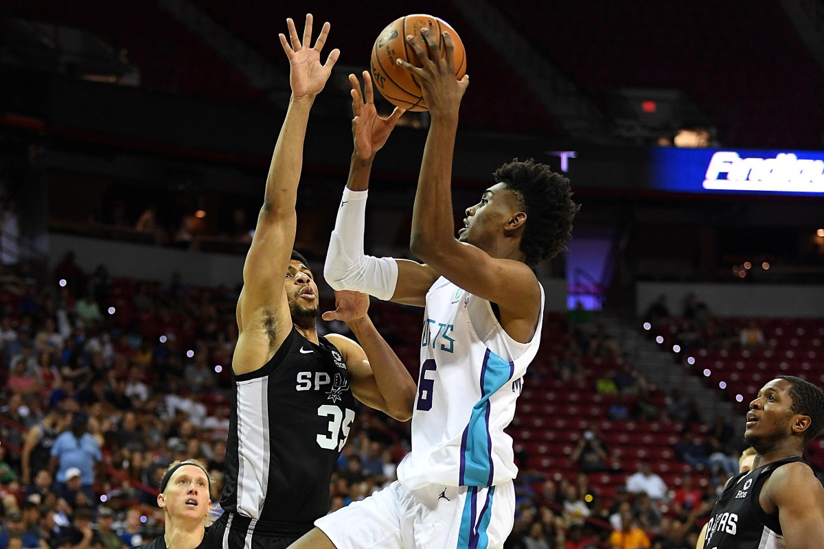 Charlotte Hornets forward Jalen McDaniels (6) shoots against San Antonio Spurs forward Jordan Barnett (35) during the second half of an NBA Summer League game at Thomas & Mack Center. (Stephen R. Sylvanie-USA TODAY Sports)