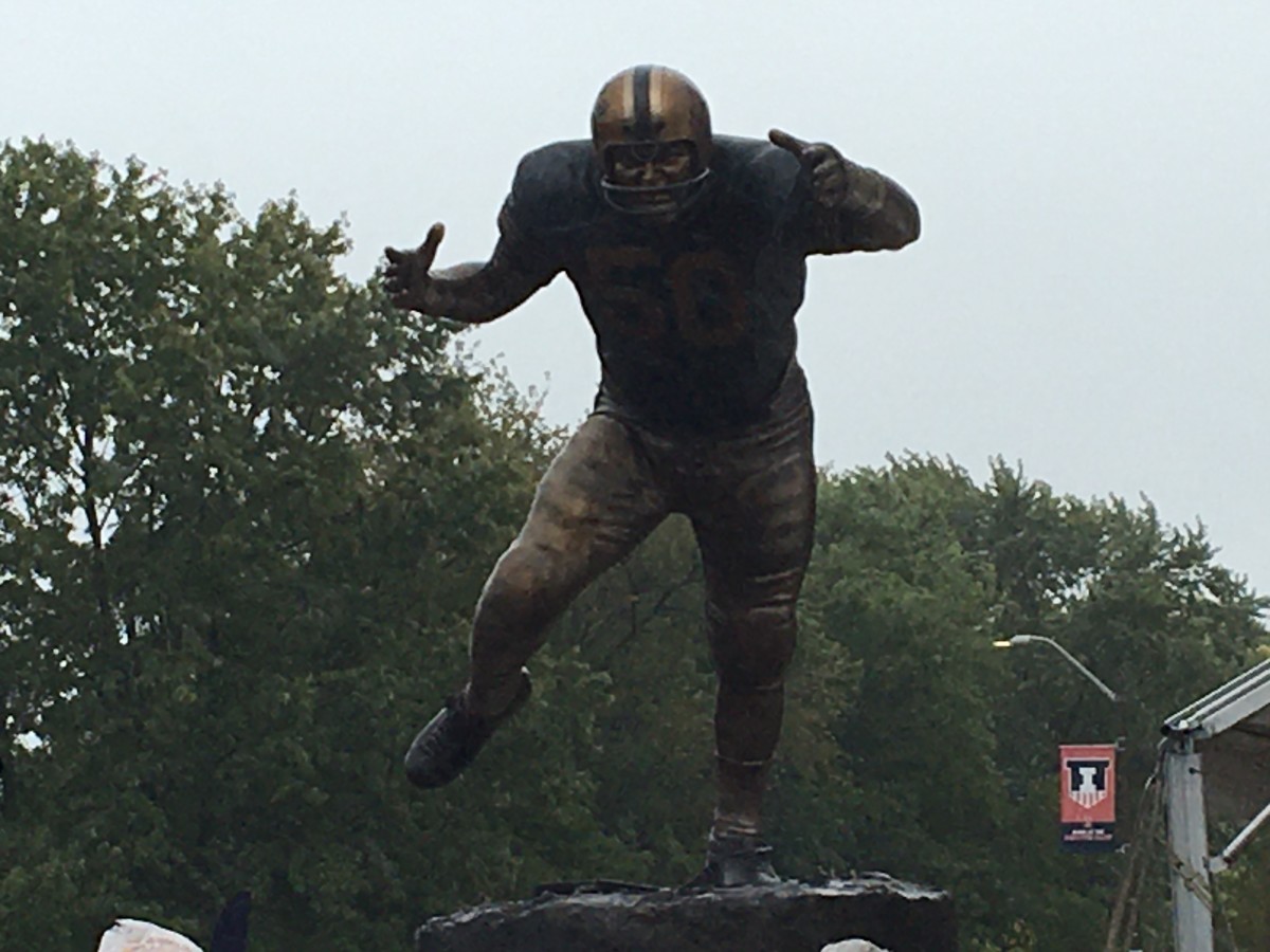 The Dick Butkus statue is unveiled on the campus of the University of Illinois on Oct. 11, 2019.