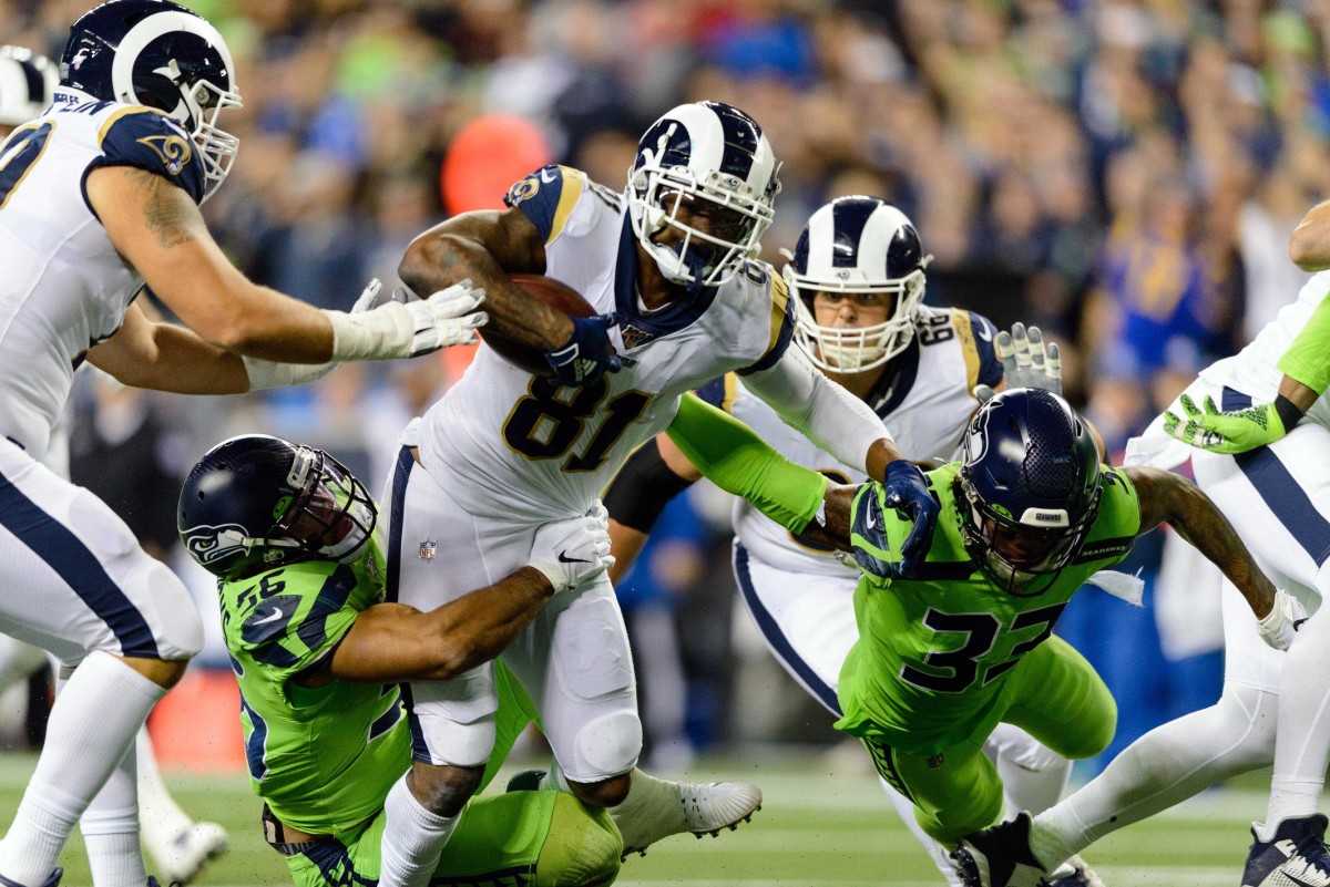 Los Angeles Rams tight end Gerald Everett (81) carries the ball after a catch during the second half against the Seattle Seahawks