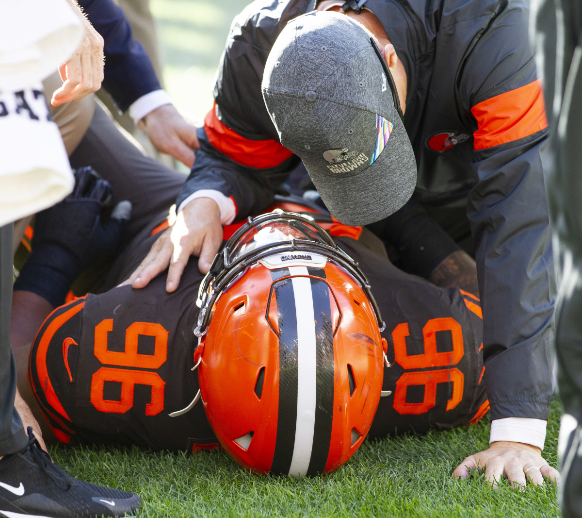 Oct 13, 2019; Cleveland, OH, USA; Cleveland Browns defensive tackle Daniel Ekuale (96) lays on the ground while team medical personnel attend to him during the fourth quarter against the Seattle Seahawks at FirstEnergy Stadium. The Seahawks won