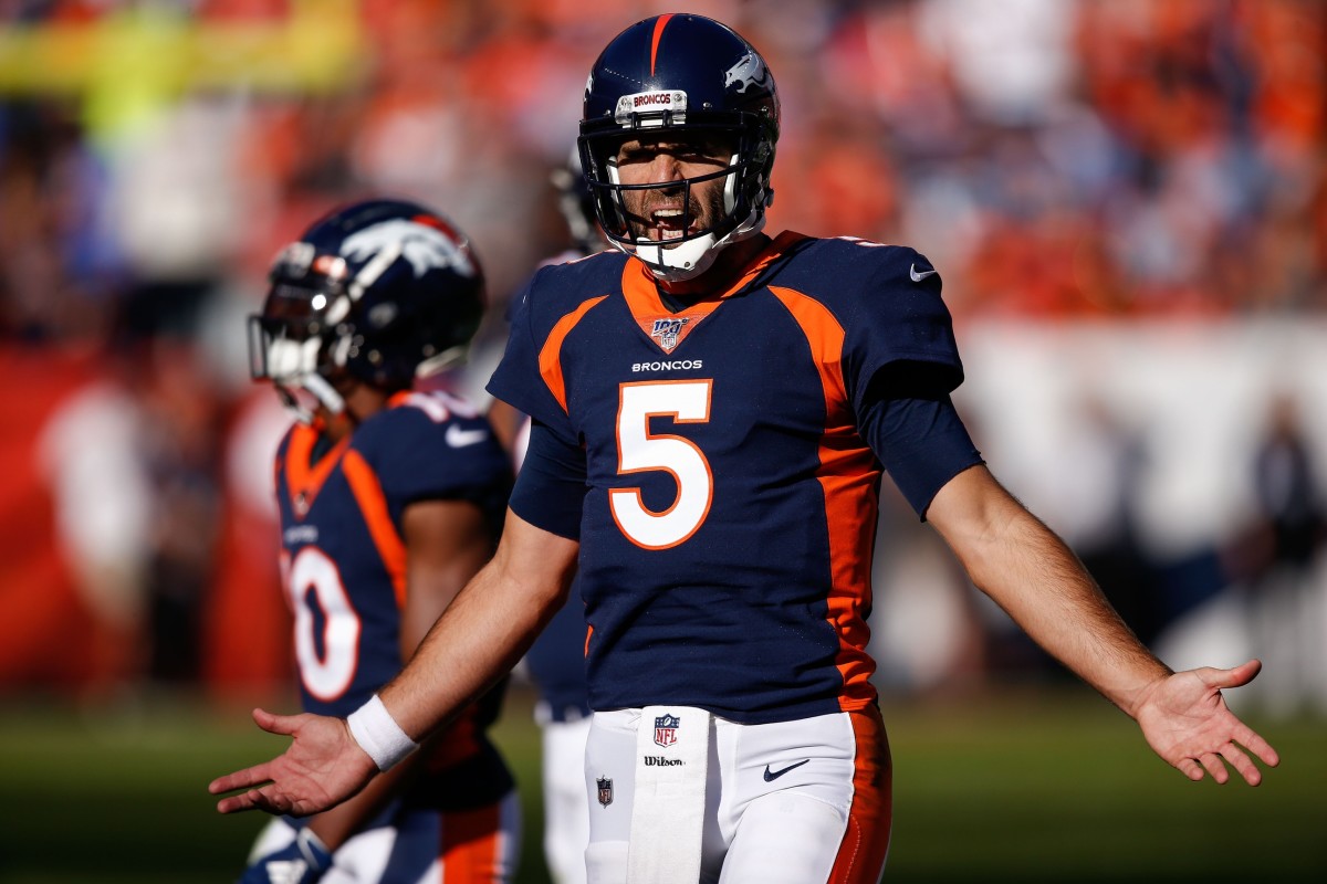 Denver Broncos quarterback Joe Flacco (5) reacts after a call in the second quarter against the Tennessee Titans at Empower Field at Mile High.