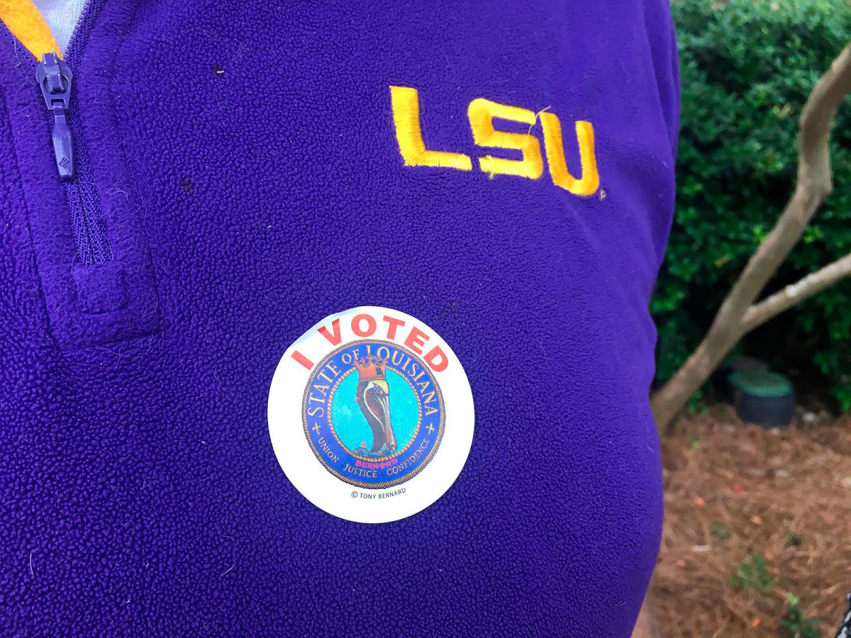 Many LSU fans tailgating Saturday had something other than the school's famous gold letters on their shirts.