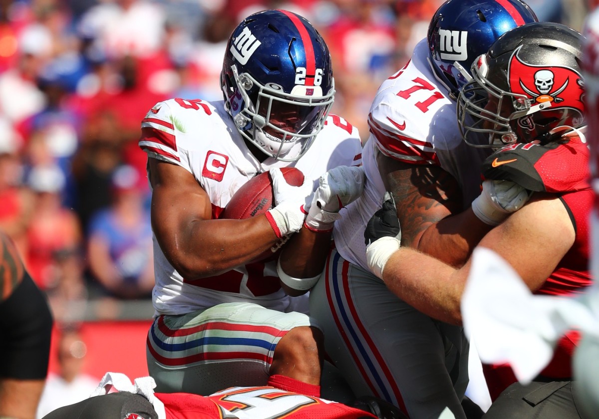 Sep 22, 2019; Tampa, FL, USA; New York Giants running back Saquon Barkley (26) runs the ball against the Tampa Bay Buccaneers during the second quarter at Raymond James Stadium. M