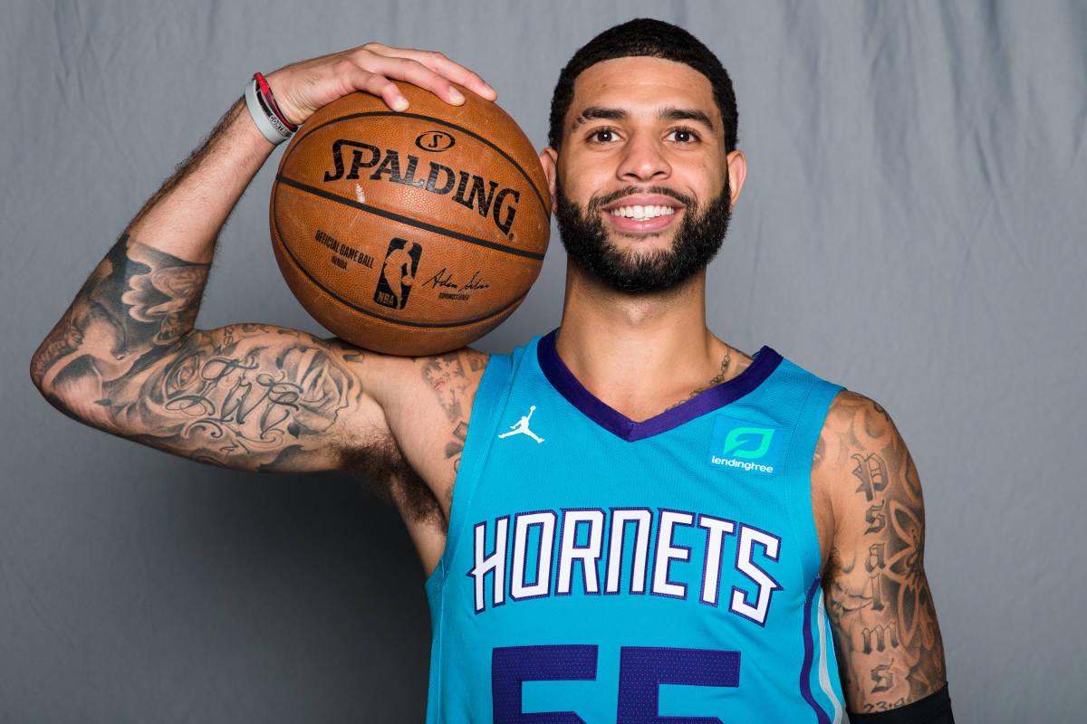 Charlotte Hornets guard Josh Perkins (55) poses for pictures during media day at Spectrum Center. (Jeremy Brevard-USA TODAY Sports)