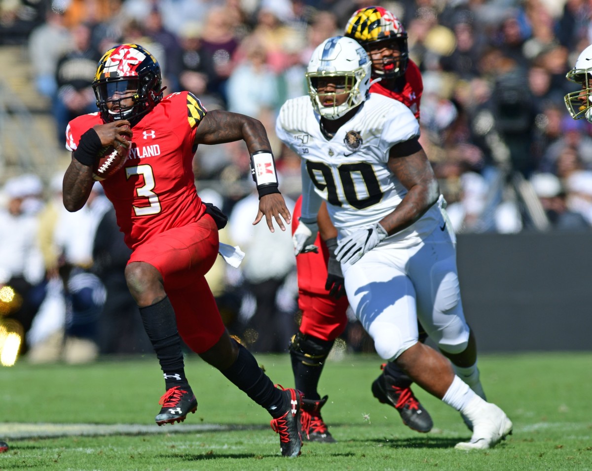 West Lafayette, IN, USA; Maryland Terrapins quarterback Tyrell Pigrome (3) runs out of the pocket against the Purdue Boilermakers in the first half at Ross-Ade Stadium. Mandatory Credit: Thomas J. Russo-USA TODAY Sports
