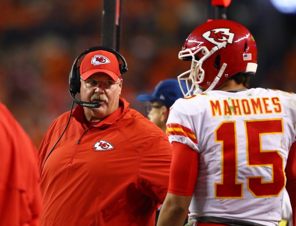 Kansas City Chiefs head coach Andy Reid with quarterback Patrick Mahomes (15) against the Denver Broncos in the second half at Broncos Stadium at Mile High.