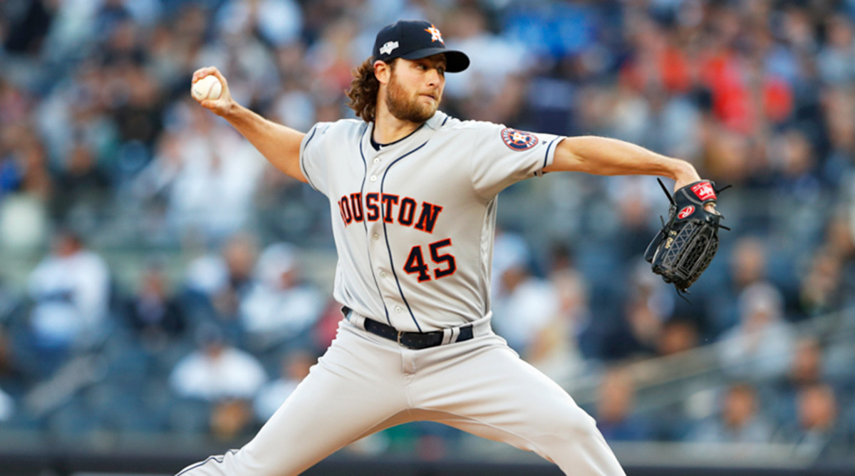Oct 15, 2019; Bronx, NY, USA; Houston Astros starting pitcher Gerrit Cole (45) throws a pitch during the first inning in game three of the 2019 ALCS playoff baseball series against the New York Yankees at Yankee Stadium. Mandatory Credit: Noah K. Murray-USA TODAY Sports