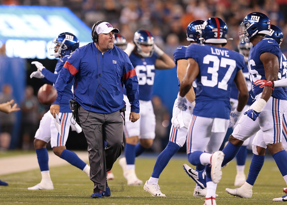 Aug 16, 2019; East Rutherford, NJ, USA; New York Giants defensive coordinator James Bettcher celebrates with players during the first half against the Chicago Bears at MetLife Stadium.