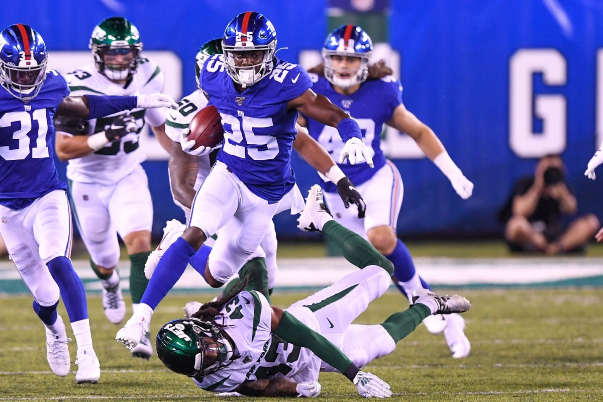 Aug 8, 2019; East Rutherford, NJ, USA; New York Jets defensive back Parry Nickerson (43) attempts to tackle New York Giants defensive back Corey Ballentine (25) on a kickoff during the second quarter at MetLife Stadium.
