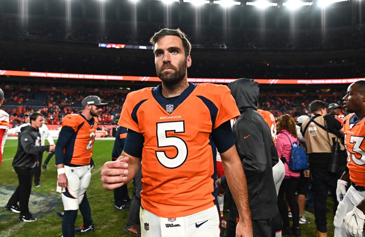 Denver Broncos quarterback Joe Flacco (5) leaves the field following the loss to the Kansas City Chiefs at Empower Field at Mile High.