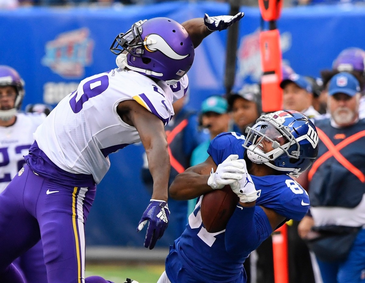 Oct 6, 2019; East Rutherford, NJ, USA; Minnesota Vikings cornerback Xavier Rhodes (29) breaks up a pass intended for New York Giants wide receiver Sterling Shepard (87) in the second half at MetLife Stadium.