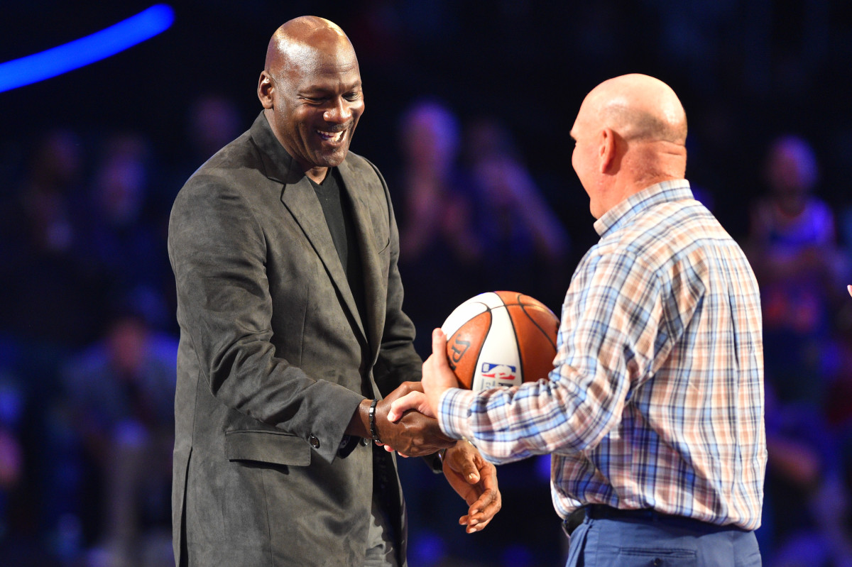 Los Angeles Clippers owner Steve Ballmer greets Charlotte Hornets owner Michael Jordan to pass the game ball to the 2019 host during the 2018 NBA All Star Game at Staples Center. (Bob Donnan-USA TODAY Sports)