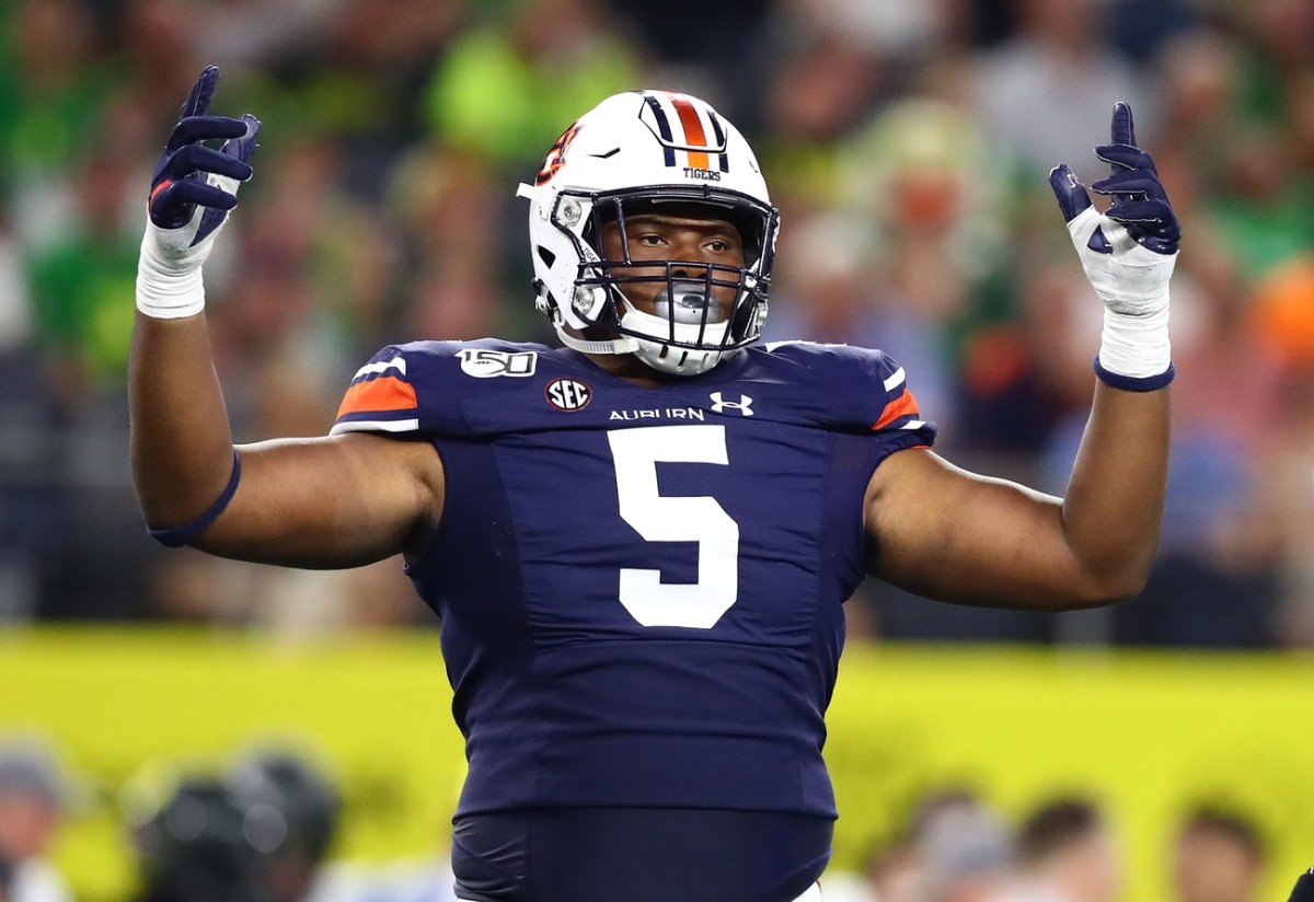 Aug 31, 2019; Arlington, TX, USA; Auburn Tigers defensive tackle Derrick Brown (5) raises his arms during the game against the Oregon Ducks at AT&T Stadium.