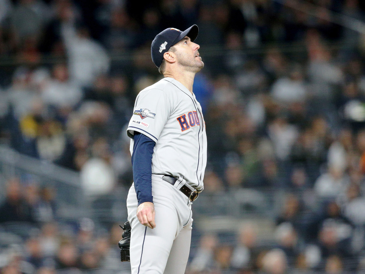 Oct 18, 2019; Bronx, NY, USA; Houston Astros starting pitcher Justin Verlander (35) watches the home run of New York Yankees first baseman DJ LeMahieu (not pictured) during the first inning of game five of the 2019 ALCS playoff baseball series at Yankee Stadium. Mandatory Credit: Brad Penner-USA TODAY Sports