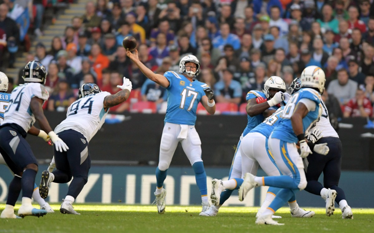 Los Angeles Chargers quarterback Philip Rivers (17) throws a 75-yard touchdown pass in the first quarter against the Tennessee Titans during an NFL International Series game at Wembley Stadium.