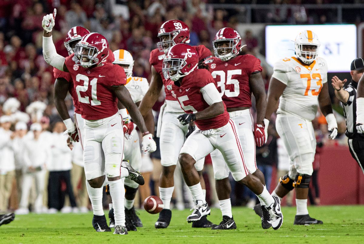Jared Mayden celebrates his interception against Tennessee
