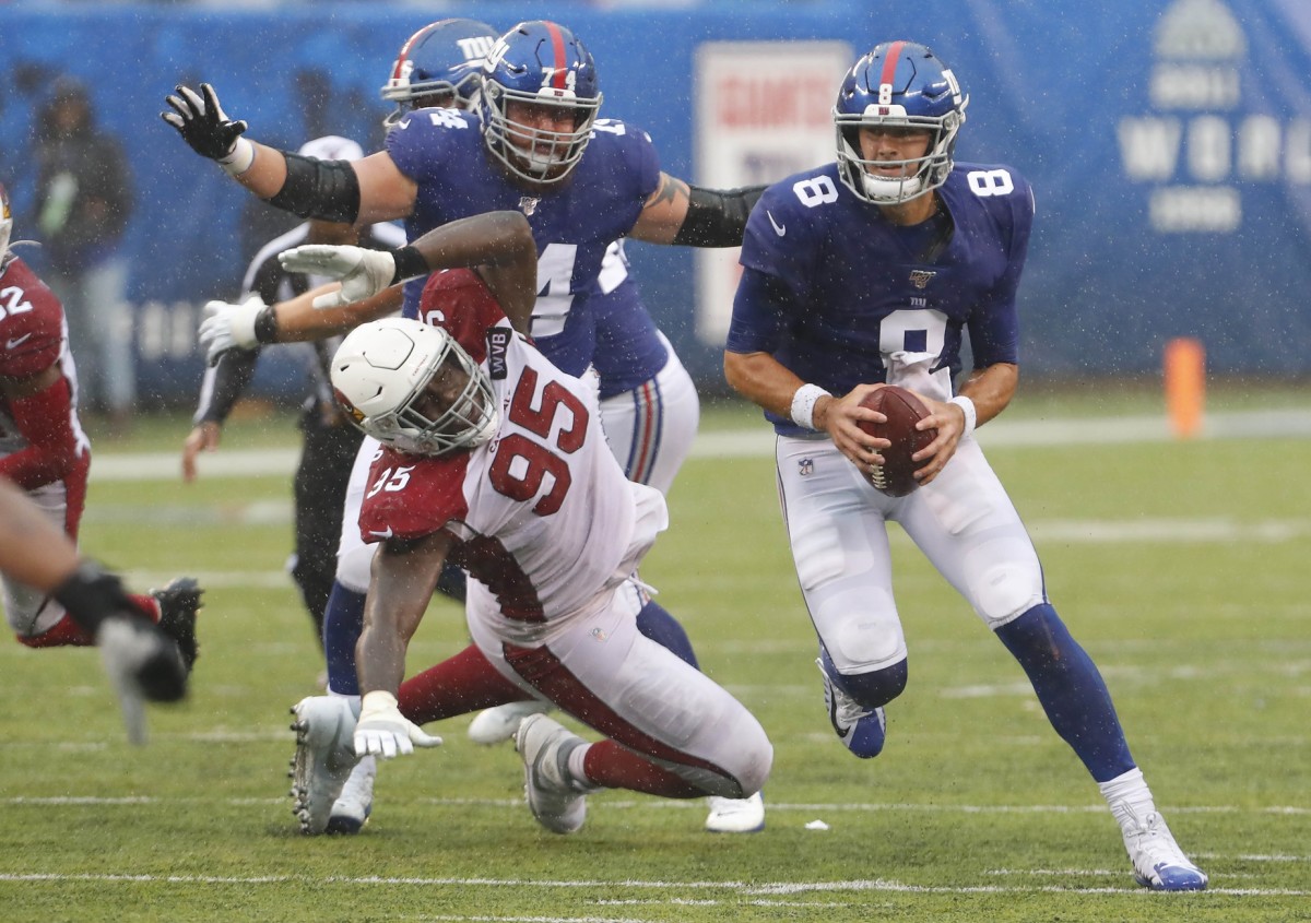 Oct 20, 2019; East Rutherford, NJ, USA; New York Giants quarterback Daniel Jones (8) rushes for yardage against the Arizona Cardinals during the second half at MetLife Stadium.