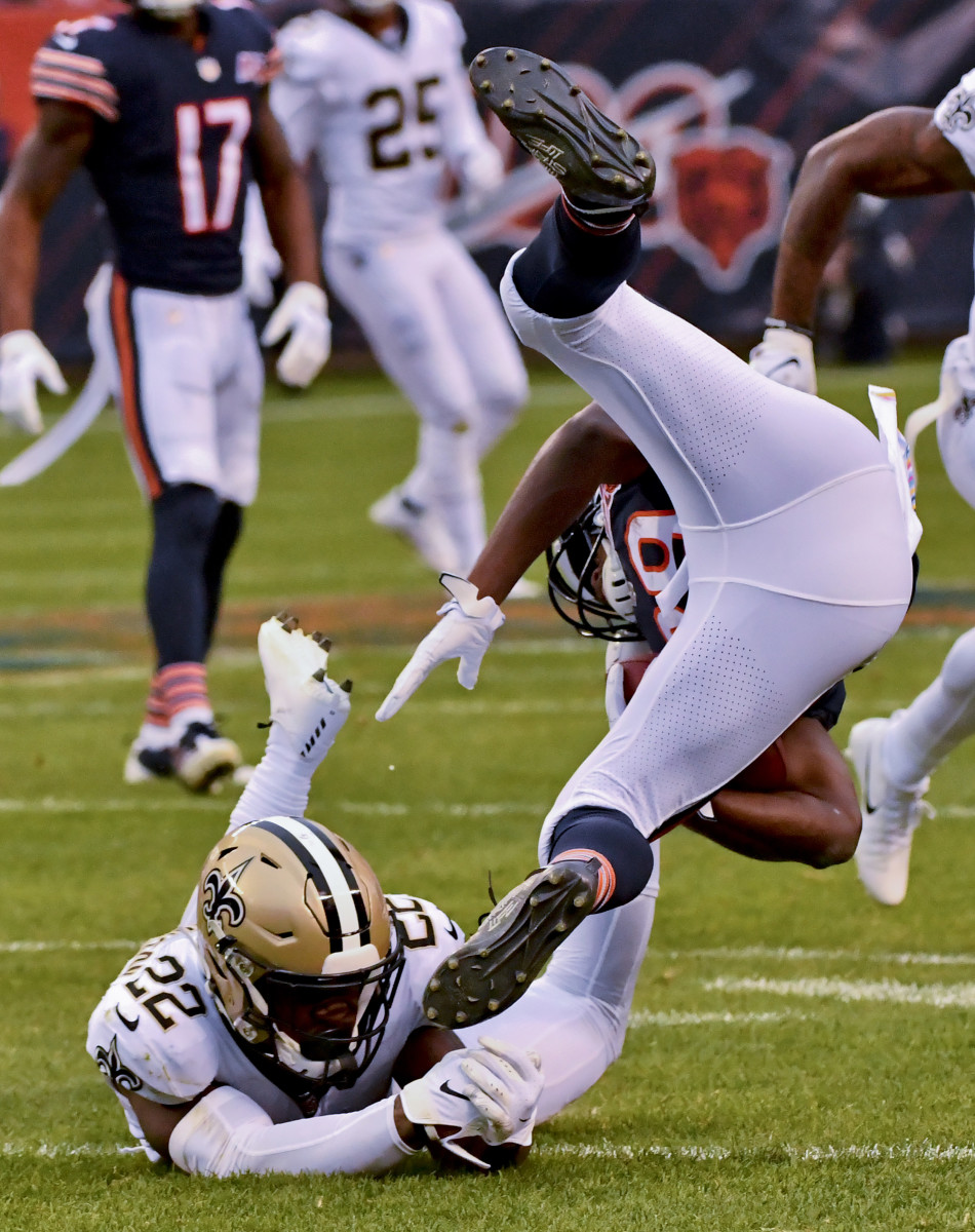 Oct 20, 2019; Chicago, IL, USA; Chicago Bears running back Tarik Cohen (29) is tackled by New Orleans Saints defensive back Chauncey Gardner-Johnson (22) during the second half at Soldier Field. Mandatory Credit: Matt Marton-USA TODAY Sports