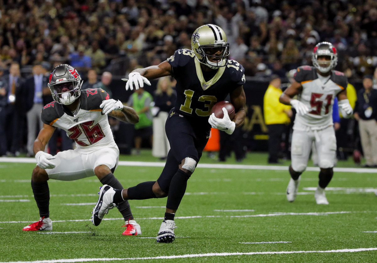 Oct 6, 2019; New Orleans, LA, USA; New Orleans Saints wide receiver Michael Thomas (13) breaks away from Tampa Bay Buccaneers defensive back Sean Murphy-Bunting (26) for a touchdown during the fourth quarter at the Mercedes-Benz Superdome. Mandatory Credit: Derick E. Hingle-USA TODAY Sports