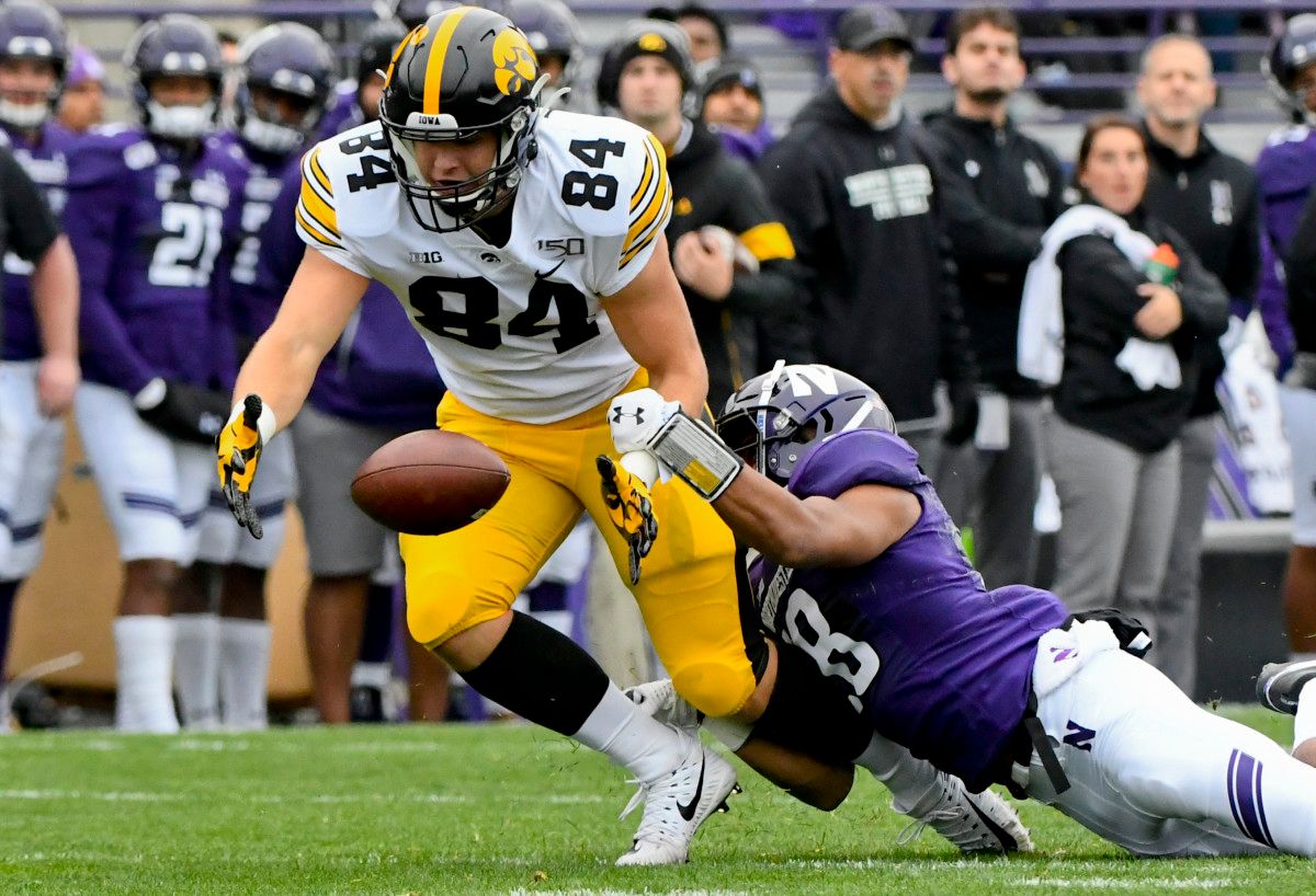 Iowa's Sam LaPorta can't hang on to a pass in the first half.