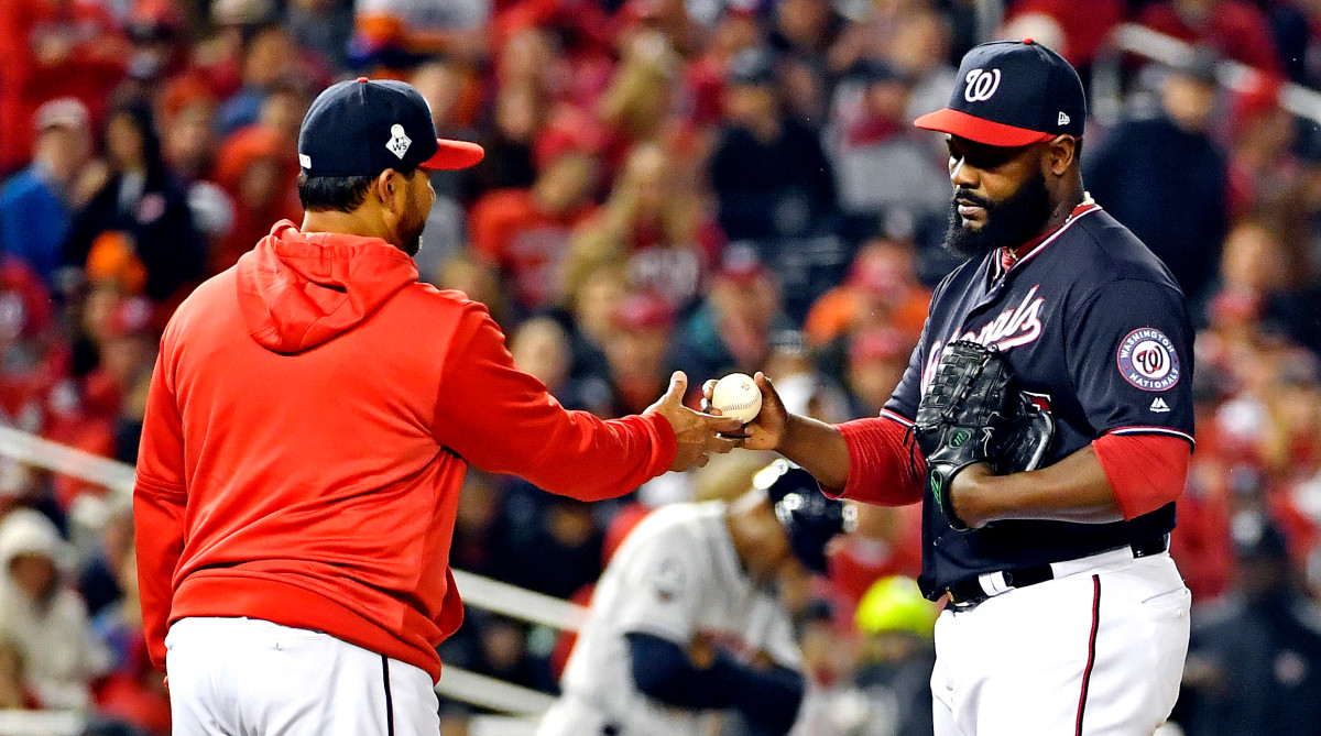 Oct 26, 2019; Washington, DC, USA; Washington Nationals manager Dave Martinez pulls relief pitcher Fernando Rodney (56) from the game during the seventh inning against the Houston Astros in game four of the 2019 World Series at Nationals Park. Mandatory Credit:  Brad Mills-USA TODAY Sports
