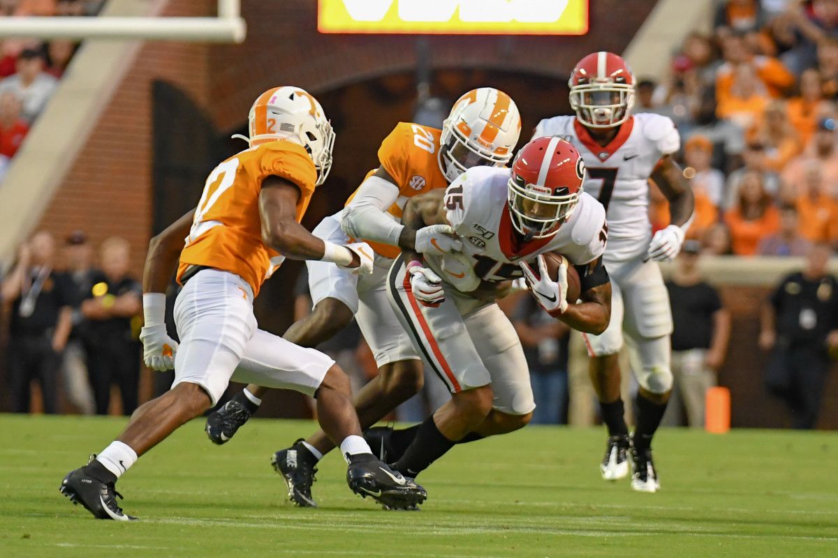 WR, Lawrence Cager is seen wearing brace on left shoulder