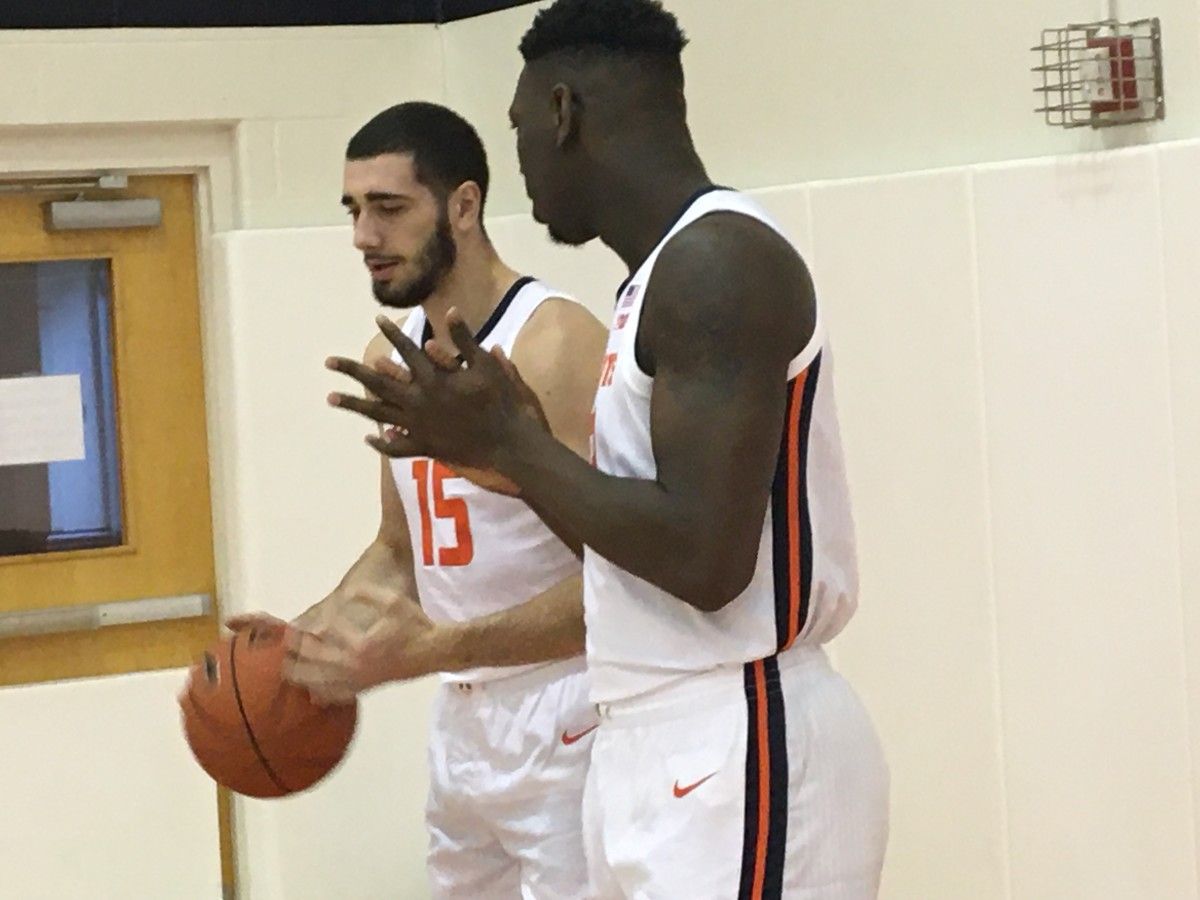 Illinois freshman center Kofi Cockburn (right) talking with sophomore forward Giorgi Bezhanishvili while shooting promotional videos during the Illini media day on Oct. 11, 2019.