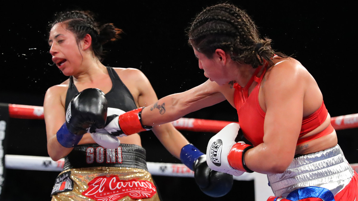 Women's boxing fighting for three-minute rounds - Sports Illustrated