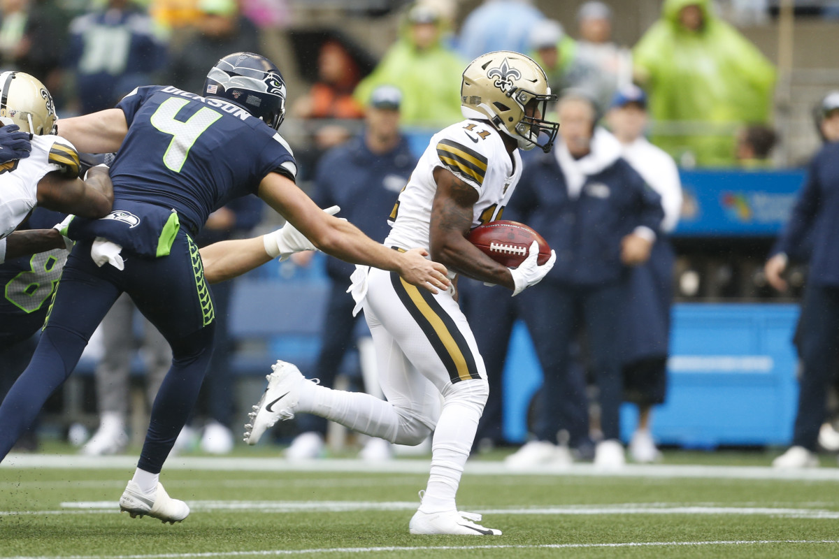 Sep 22, 2019; Seattle, WA, USA; New Orleans Saints wide receiver Deonte Harris (11) returns a punt for a touchdown against the Seattle Seahawks during the first quarter at CenturyLink Field. Mandatory Credit: Joe Nicholson-USA TODAY Sports