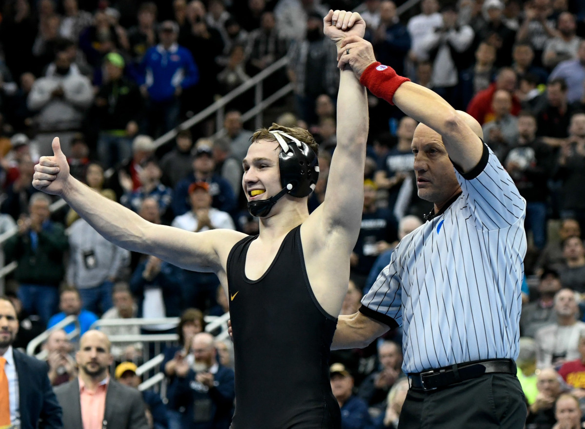 Iowa's Spencer Lee is going for his third NCAA title this season, but he is also training to be a part of the U.S. Olympic team.