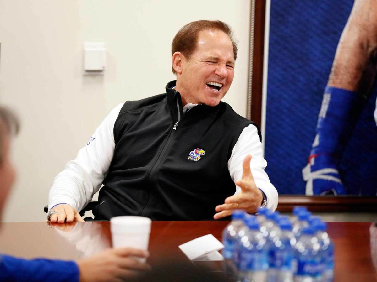 After two seasons away from the sidelines, Miles was brought in by his longtime friend, new Kansas AD Jeff Long, to turn the Jayhawks around.