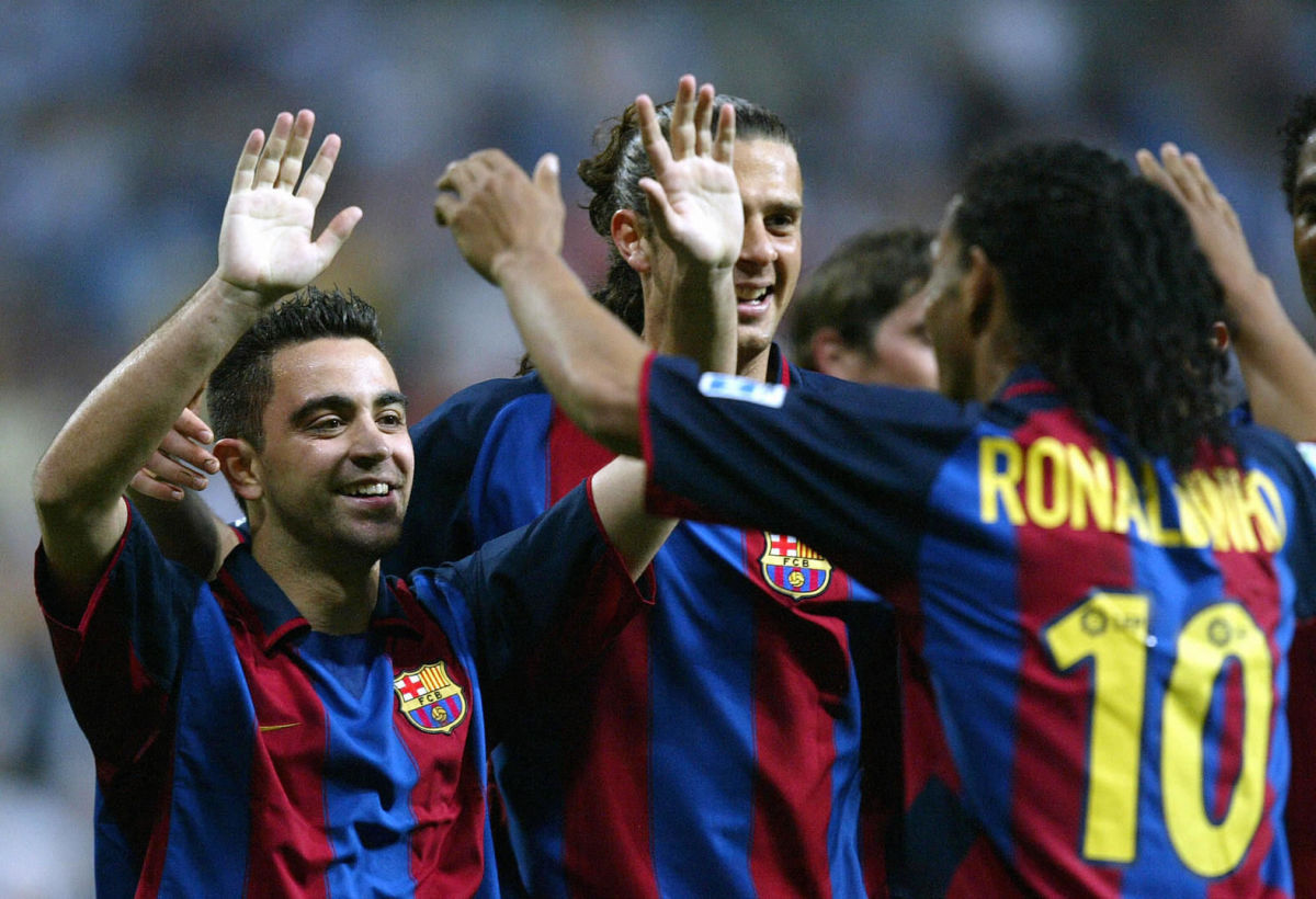 fc-barcelona-s-xavi-l-celebrates-his-g-5c77b257f50b283229000001.jpg