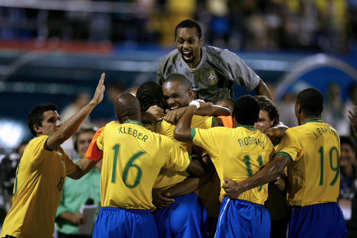 brazil-s-footballers-celebrate-their-fir-5d0664918c1767b052000018.jpg