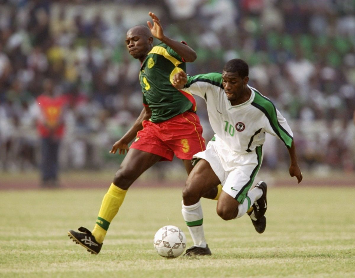 jay-jay-okocha-and-pierre-wome-nlend-5d31cf0a3bba5e4788000001.jpg