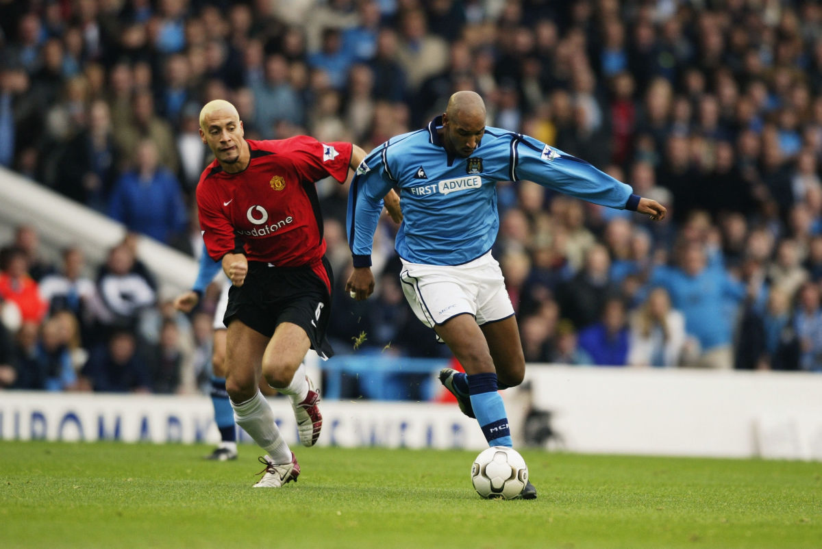 nicolas-anelka-of-manchester-city-and-rio-ferdinand-of-manchester-united-5c6993685b6742805b000019.jpg