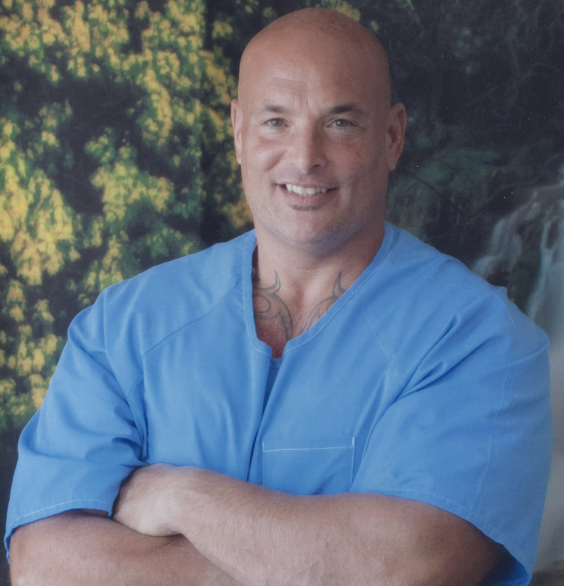 Naposki poses for a photo in his prison uniform in 2017.