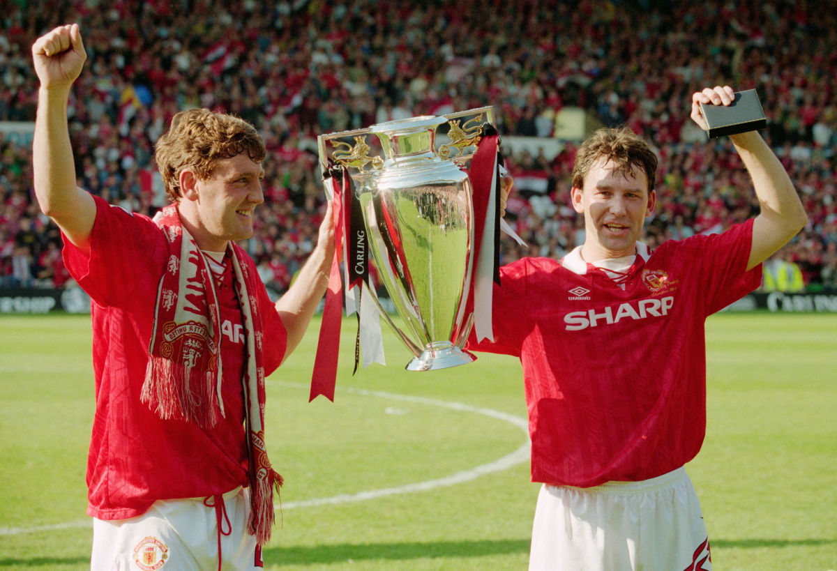 steve-bruce-and-bryan-robson-with-the-fa-carling-premiership-trophy-1994-5cc20aed0bde22a657000012.jpg