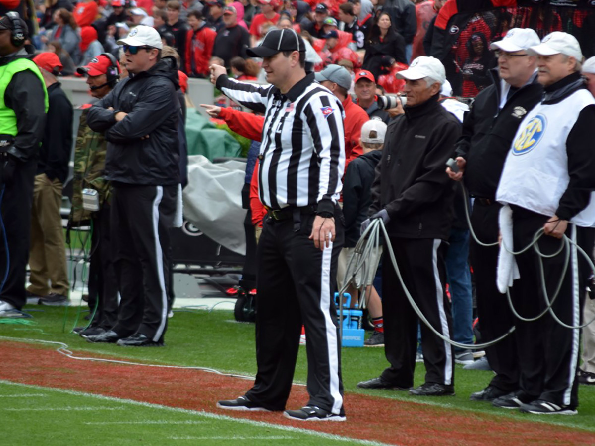 Among the numerous pre-snap responsibilities of the line judge: signaling to the other officials that the widest receiver is not on the line of scrimmage.