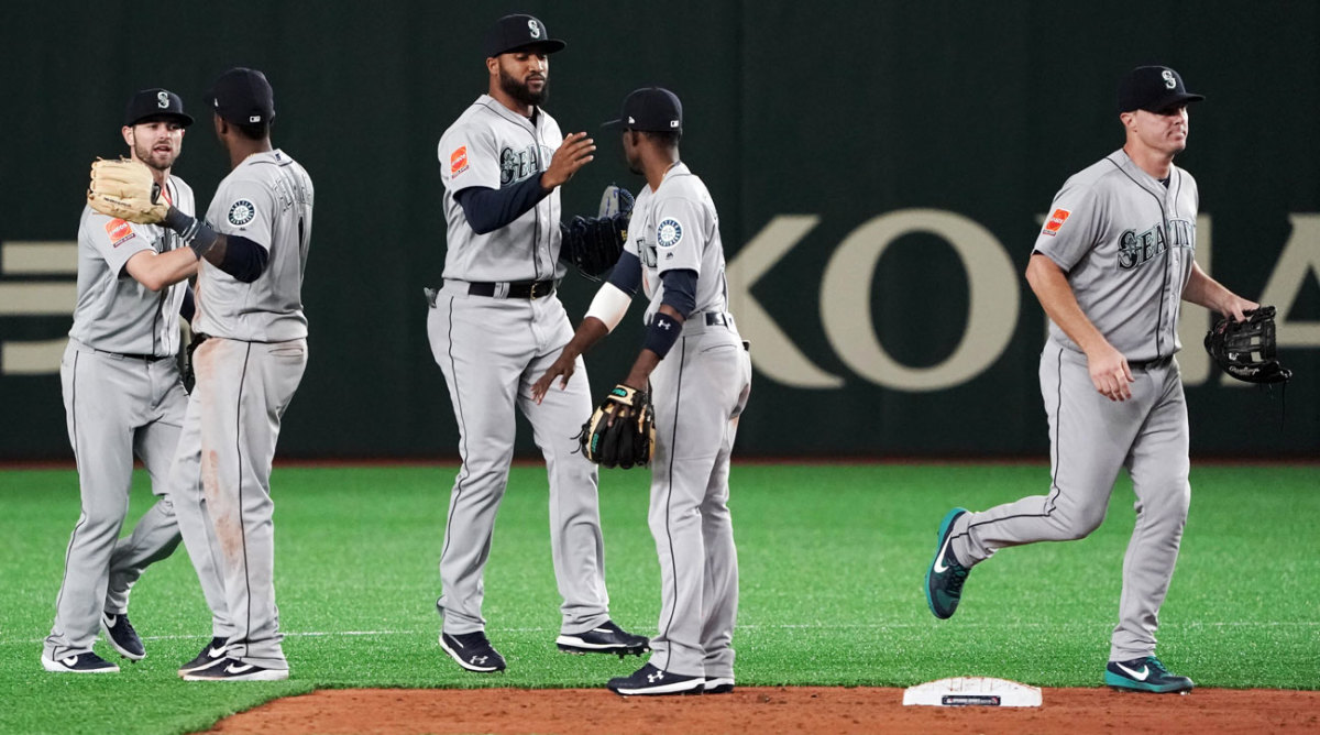 Mariners beat A's in Japan to open season Sports Illustrated