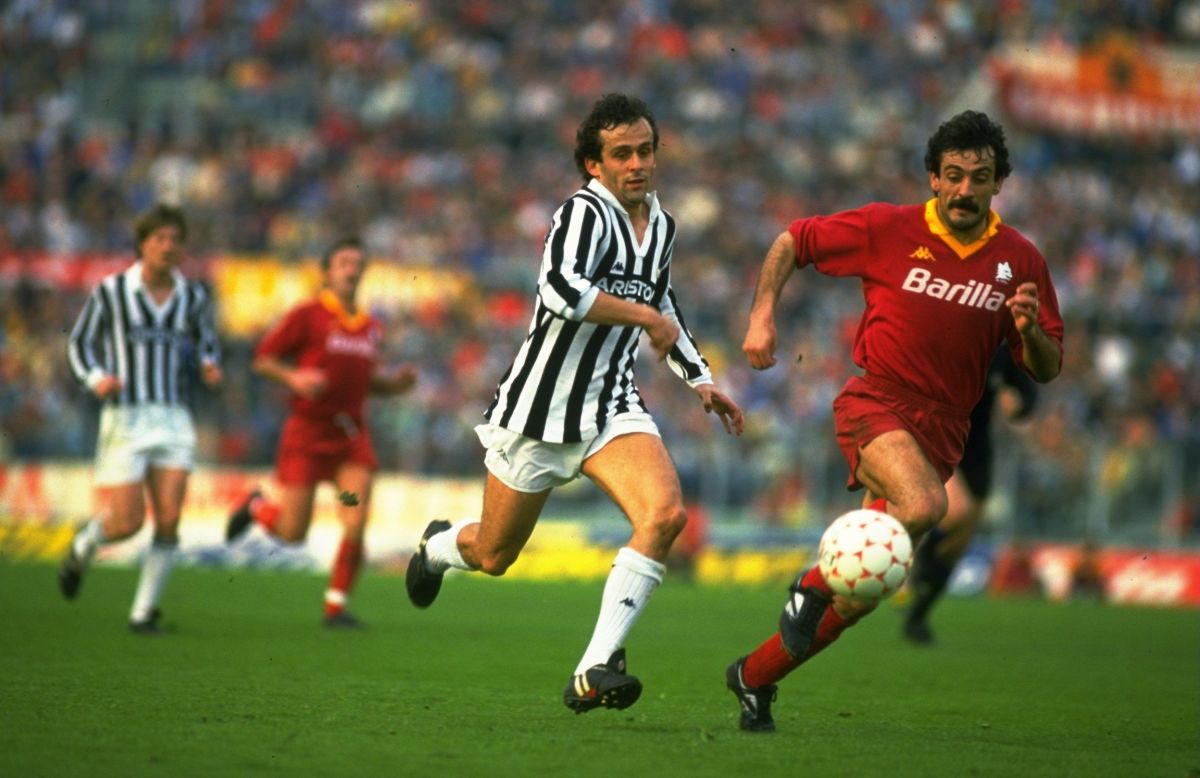 michel-platini-of-juventus-and-emidio-oddi-of-roma-5d515ee86948d92cbf000001.jpg
