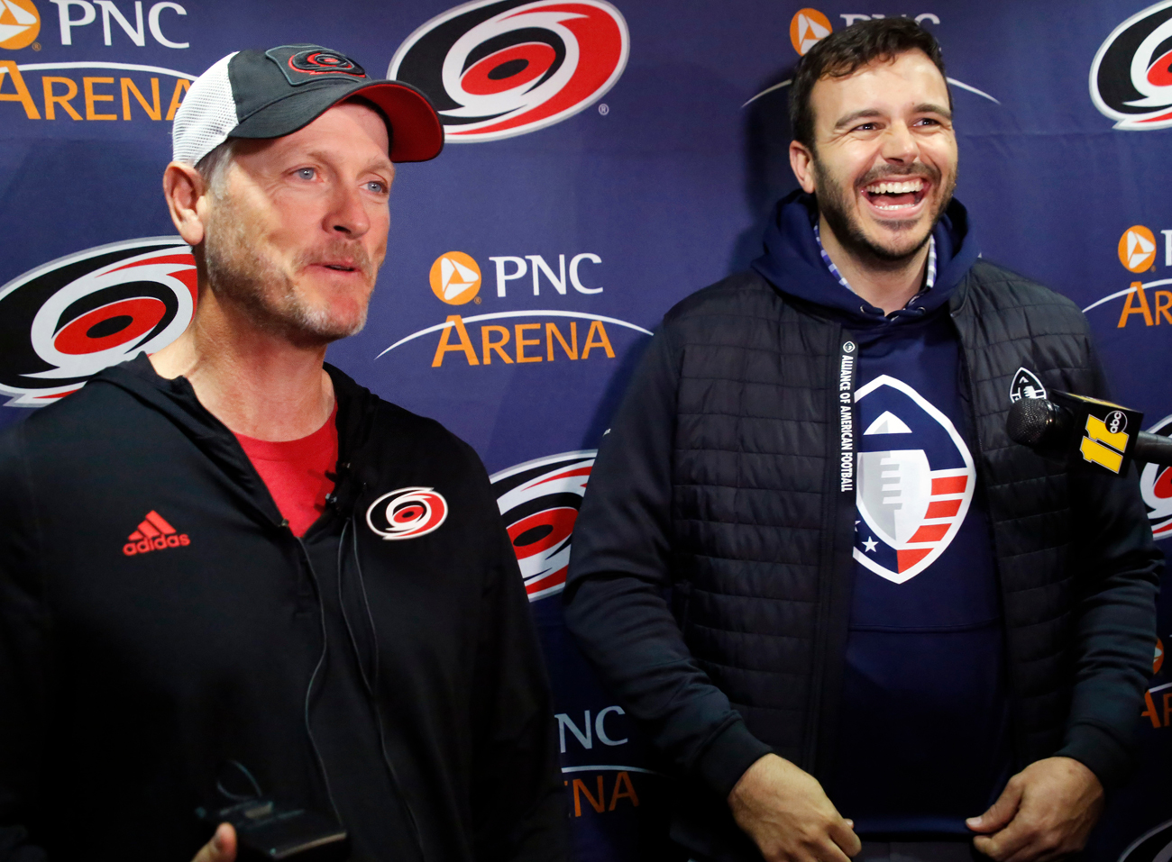Tom Dundon and Charlie Ebersol, after the NHL owner’s $250 million pledge momentarily kept the AAF afloat.