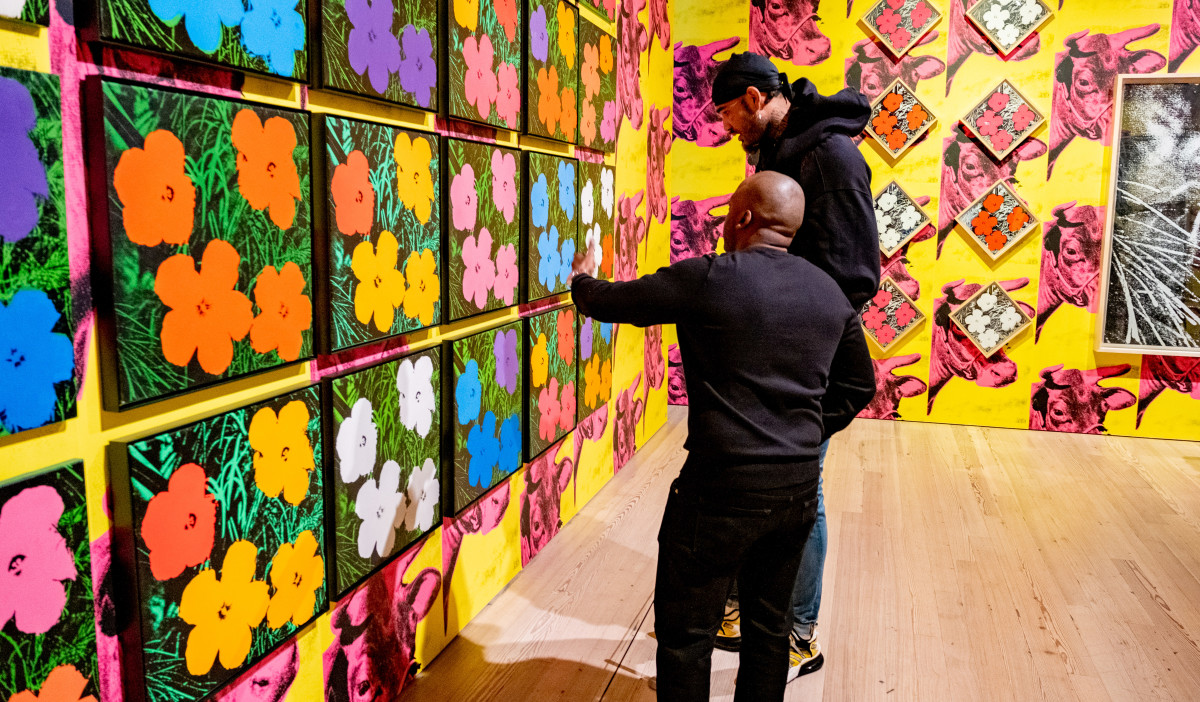New York-based art adviser and collector Gardy St. Fleur guides Sacramento Kings center Willie Cauley-Stein through The Whitney Museum of American Art during a visit.