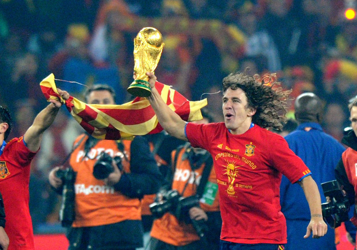 spain-s-defender-carles-puyol-runs-with-5cb1dbb17df23d8643000001.jpg