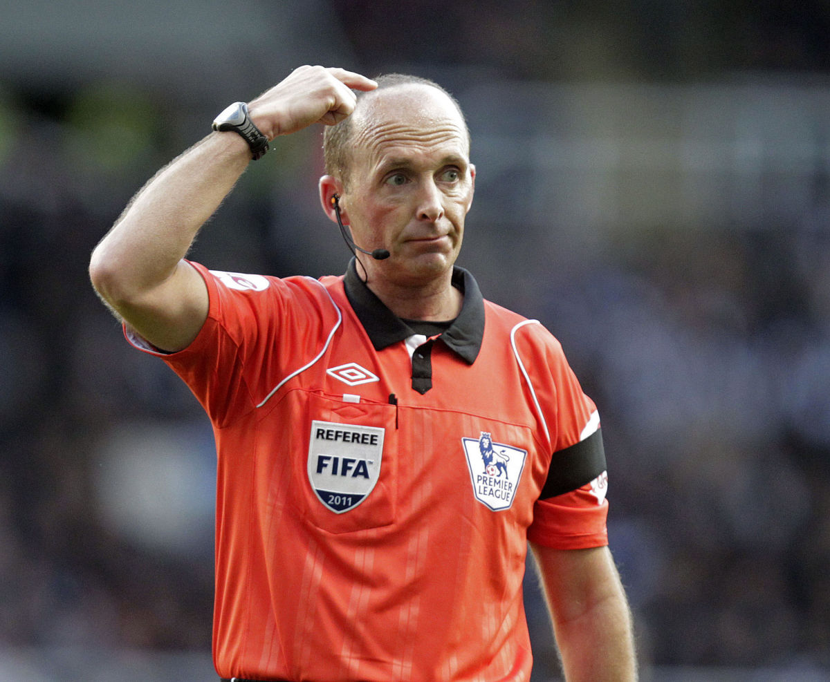 referee-mike-dean-gestures-during-the-en-5ca4bfa6b7c5b4d3f3000001.jpg