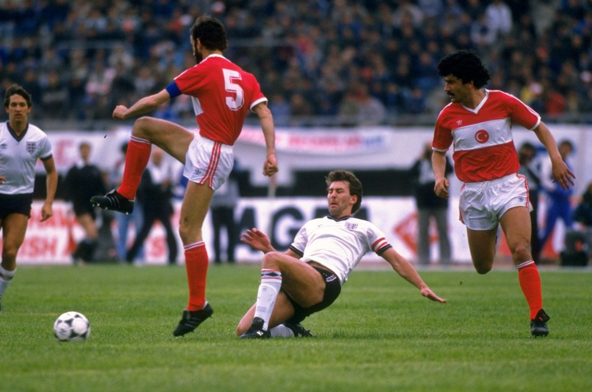 bryan-robson-of-england-and-ongi-erhan-of-turkey-5c966acbdfd9d37afa000001.jpg