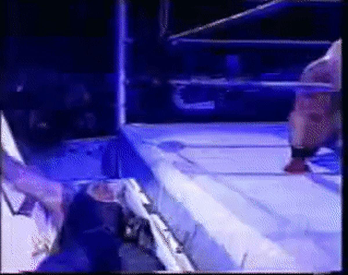 undertaker-sit-up-casket.gif