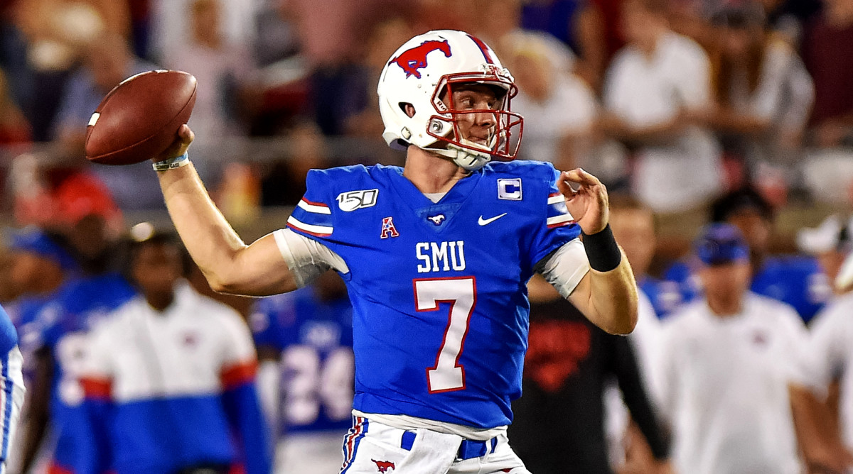Oct 5, 2019; Dallas, TX, USA; SMU Mustangs quarterback Shane Buechele (7) looks downfield during the second quarter against Tulsa Golden Hurricanes at Gerald J. Ford Stadium. Mandatory Credit: Timothy Flores-USA TODAY Sports