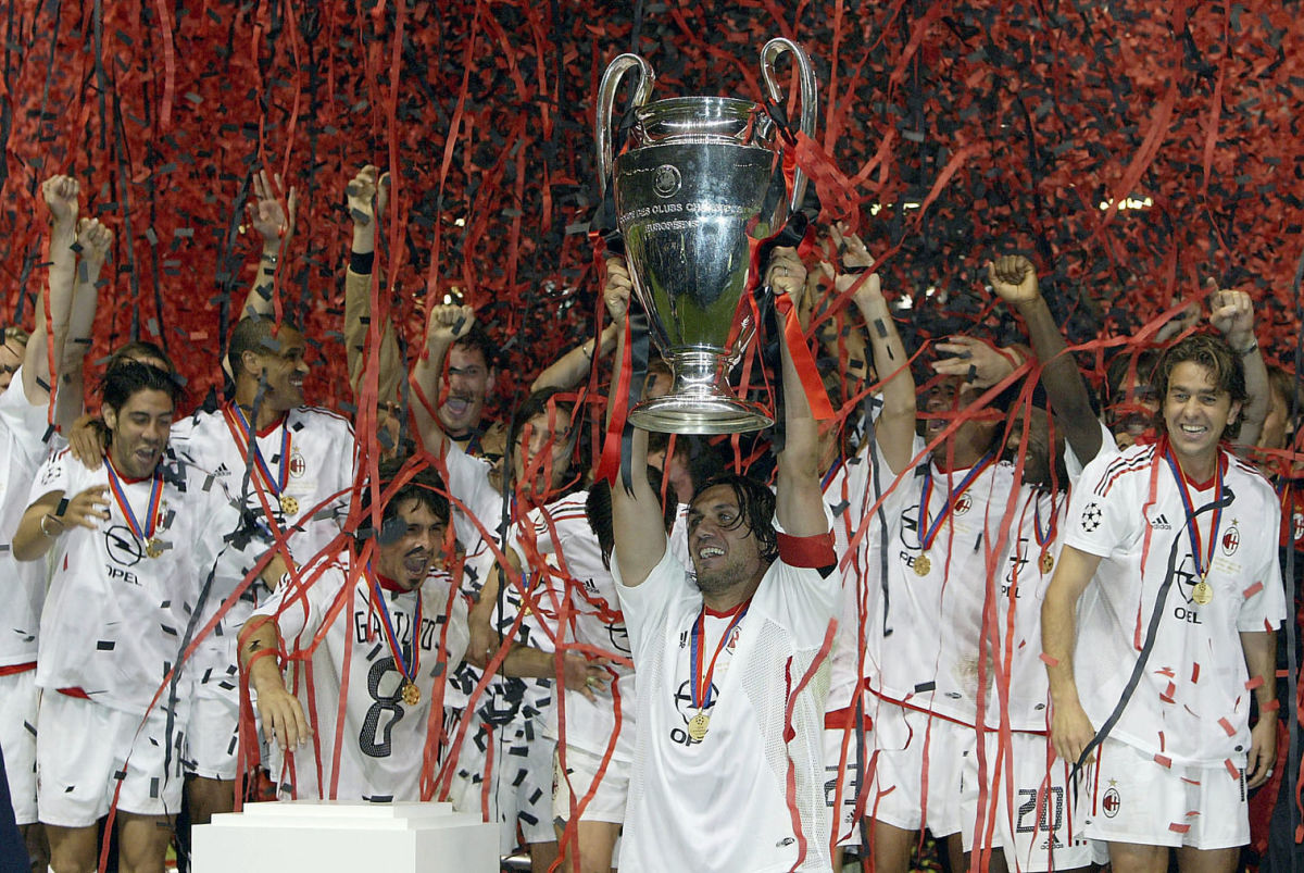 captain-paolo-maldini-if-milan-lifts-the-trophy-5c869d84b8a68526c4000023.jpg